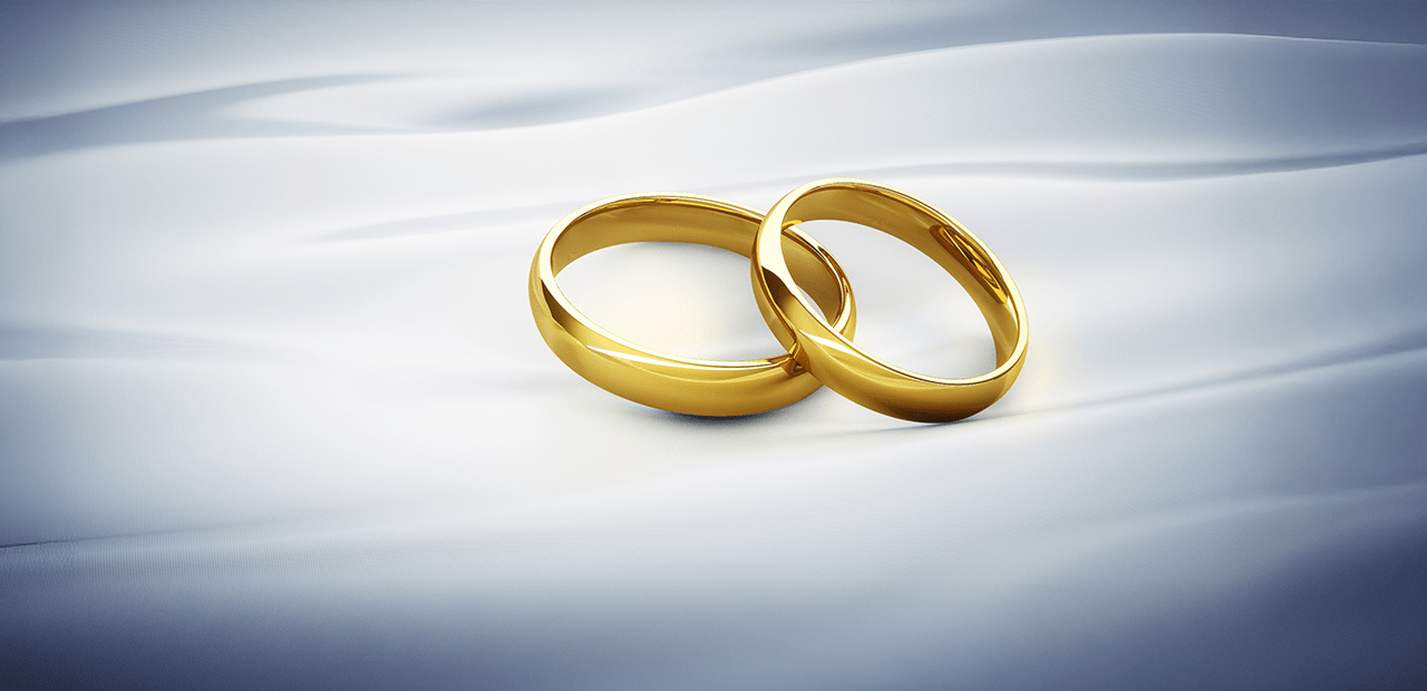 Gold wedding bands symbolizing how prenuptial agreements can serve as powerful estate planning tools to protect assets and support long-term financial goals.