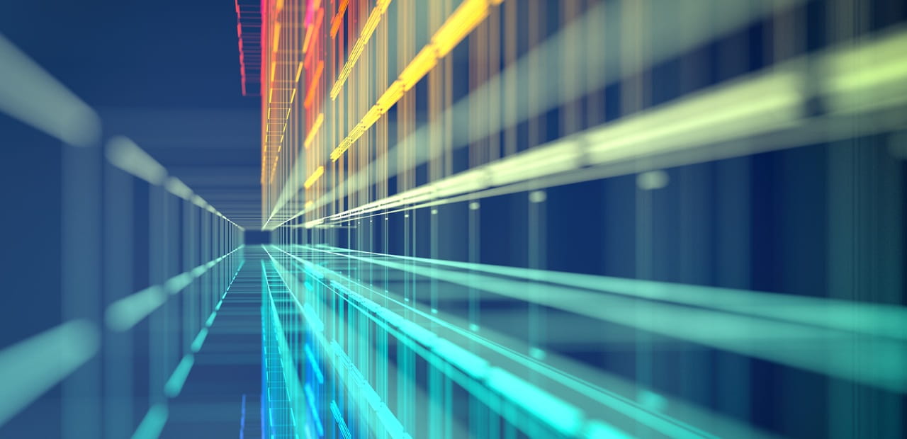 Abstract digital data corridor with teal and yellow light streaks, representing the S&P 500’s shift toward technology-driven, asset-light businesses and the growing influence of AI-related sectors on market resilience.